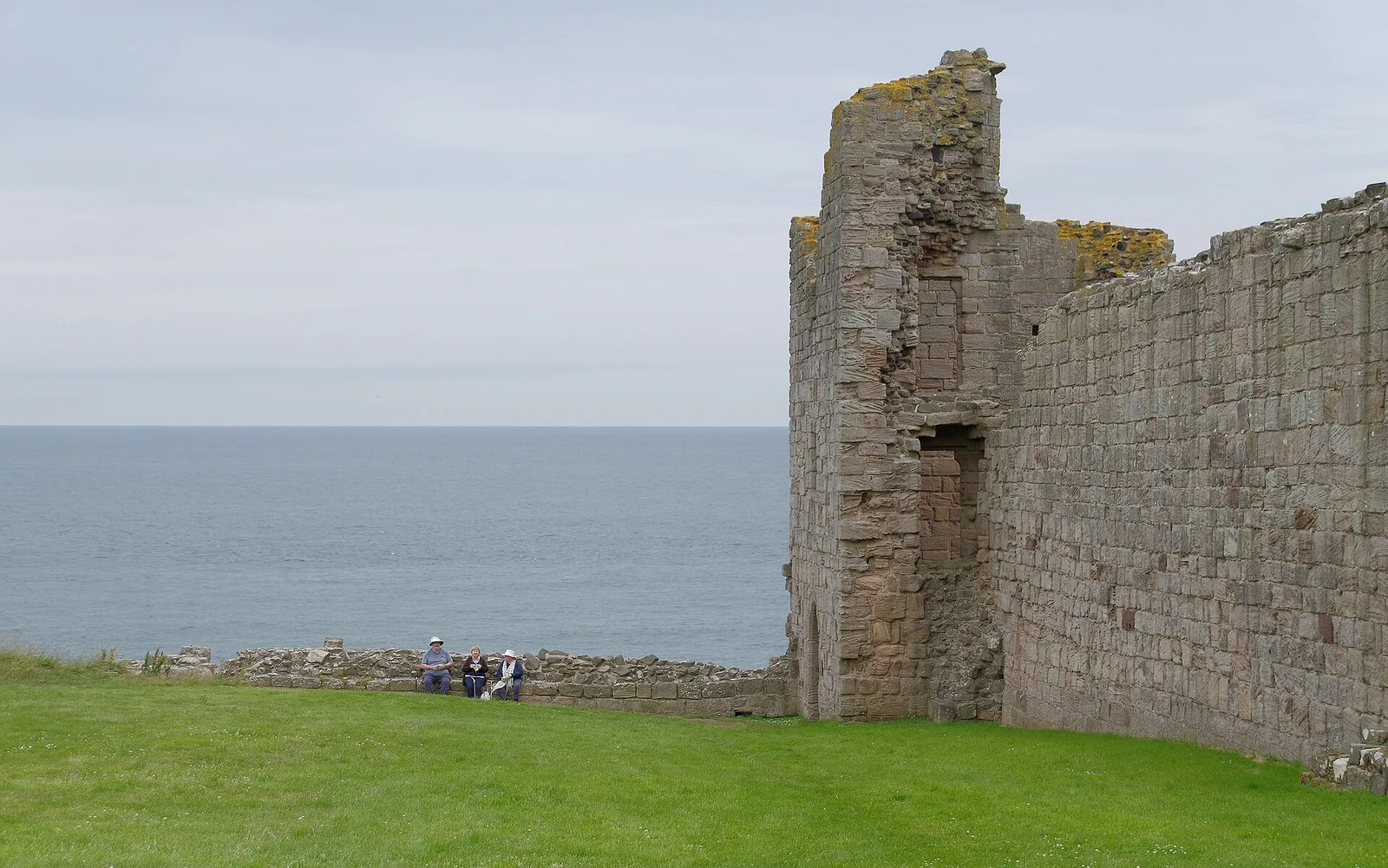 The ruins of Dunstanburgh on their headland